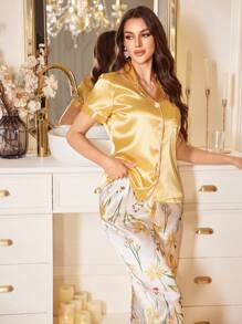 Conjunto de pijama feminino amarelo de manga curta e calça estampada