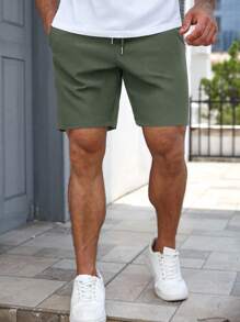 Manfinity RelaxMax Men Summer Casual Solid Drawstring Waist Slant Pocket Shorts