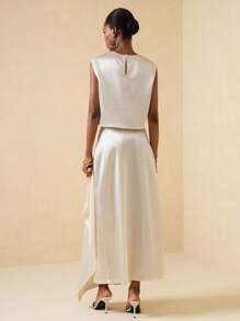 Vesra Conjunto de 2 piezas para mujer compuesto por una blusa de satén brillante con escote en V, holgada y corta sin mangas con bajo asimétrico y con volantes, y una falda con cintura elástica, en color albaricoque. Elegante, de lujo y versátil, apto para múltiples ocasiones. - Albaricoque - Ver 2