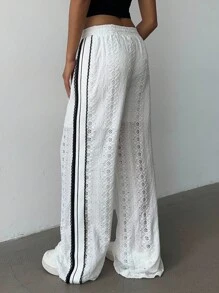 TrendSteals بنطلون نسائي كاجوال عصري رياضي بخصر مربوط بسحاب، مع شريط جانبي متباين اللون وفتحات جانبية، قصة فضفاضة وواسعة الساق - أبيض - مشاهدة 2