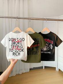 SHEIN 三件装男童休闲可爱街头风T恤套装，舒适时尚，简约实用，卡通印花宽松T恤，适合儿童穿着，也适合返校季穿着。此外，也适合生日派对、晚宴、演出、婚礼和洗礼等场合。纯棉印花T恤，男童时尚服装，男童T恤，男童服装。 - 彩色 - 查看 2