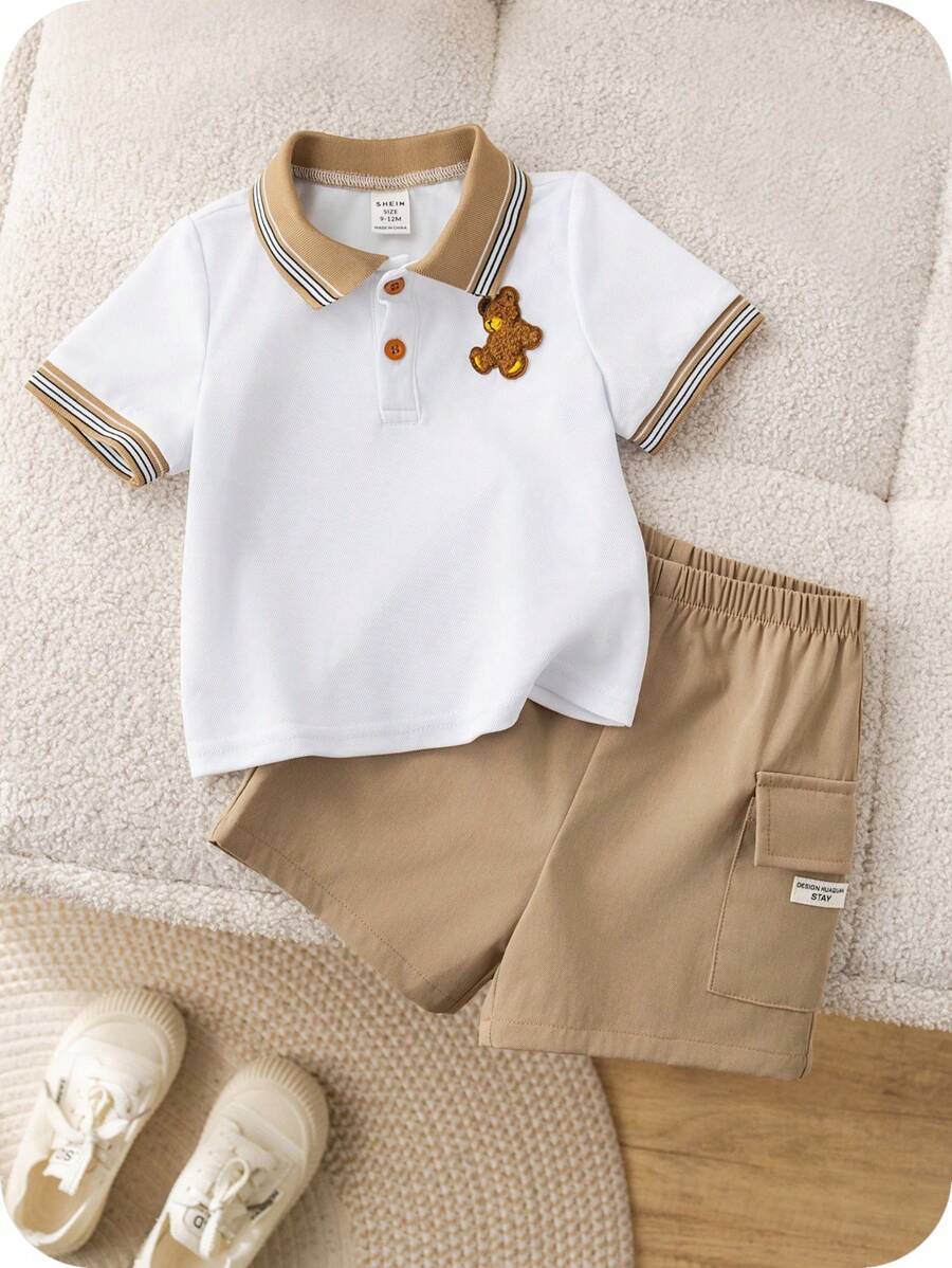 SHEIN Conjunto de 2 peças para bebê menino, fofo e casual, com estampa de urso em blocos de cores, composto por camisa polo de manga curta e shorts com elástico na cintura. Ideal para festas de aniversário, eventos noturnos, apresentações, casamentos, comemorações de 1 mês, batizados e chás de bebê. Roupa de verão para bebê menino. Conjunto de shorts para bebê menino. Camisa polo e shorts para bebê menino. Conjunto de verão para bebê menino. Conjunto de roupas para bebê menino. Shorts cáqui para bebê menino. - Multicolorido - Ver 1