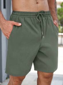 Manfinity RelaxMax Men Summer Casual Solid Drawstring Waist Slant Pocket Shorts