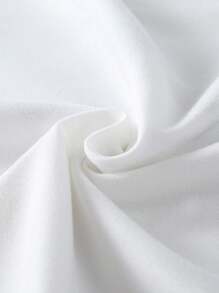 Camiseta infantil feminina com estampa de laço tricotado, gola redonda e detalhes em renda com babados. Ideal para o outono. - Branco - Ver 7