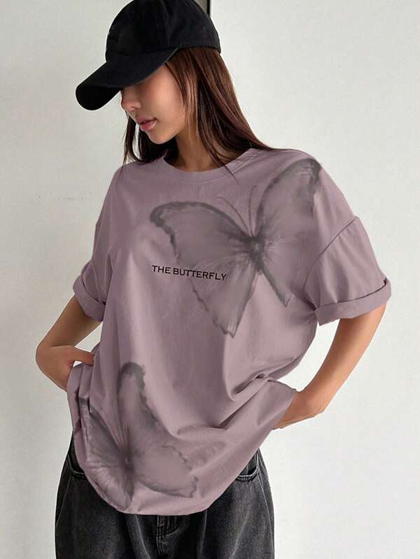DAZY Camiseta oversize con gráfico de mariposa y eslogan "THE BUTTERFLY" de manga abombada