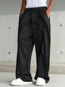 PAVTROS 男士年轻街头风格做旧开放式双层毛边拱形结构宽松阔腿运动裤，松紧腰针织运动裤带有微妙的做旧细节，休闲街头风格，适合日常休闲时尚穿着，适合作为节日礼物黑色运动裤黑色慢跑裤男士黑色裤子宽松运动裤男士黑色宽松运动裤男士阔腿裤男士宽松裤男士运动裤男士运动裤宽松运动裤男士 - 黑色 - 查看 5