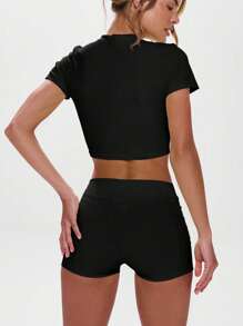 Musera Sport 圆领短袖修身运动上衣，适合健身房、板式网球、网球、匹克球、瑜伽、普拉提等运动，也适合日常休闲穿着。 - 黑色 - 查看 3