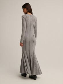 Nöista Nöista Grey Ribbed Knit Maxi Dress With Long Sleeves, Fitted Body, And Flared Hem Detail For A Modern Touch. Perfect For Elevating A Casual Look, Ideal For Cooler Days, And Comfortable For Everyday Wear.