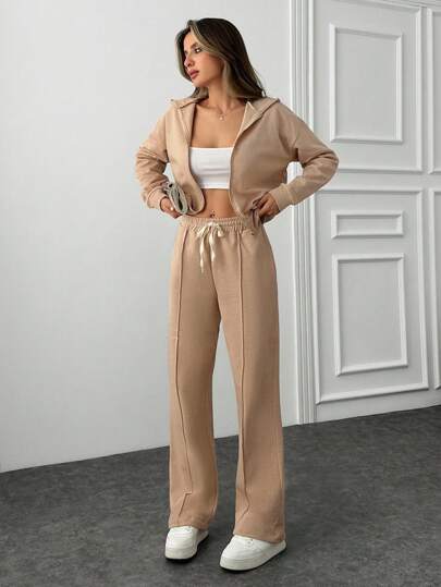 EURMUSE Street Style Aesthetic Two Pieces, Loose Sweatpants, High-Waisted Design, Ankle Ties Detail, Casual Wear, Athletic-Inspired Look, Comfortable Fit, Modern Fashion, Urban Style, Elasticated Waist, Drawstring Detail, Relaxed Silhouett, Contemporary Design, Off-Duty Look, Fashion Forward, Sportswear, Weekend Wear