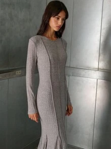 Nöista Nöista Grey Ribbed Knit Maxi Dress With Long Sleeves, Fitted Body, And Flared Hem Detail For A Modern Touch. Perfect For Elevating A Casual Look, Ideal For Cooler Days, And Comfortable For Everyday Wear.
