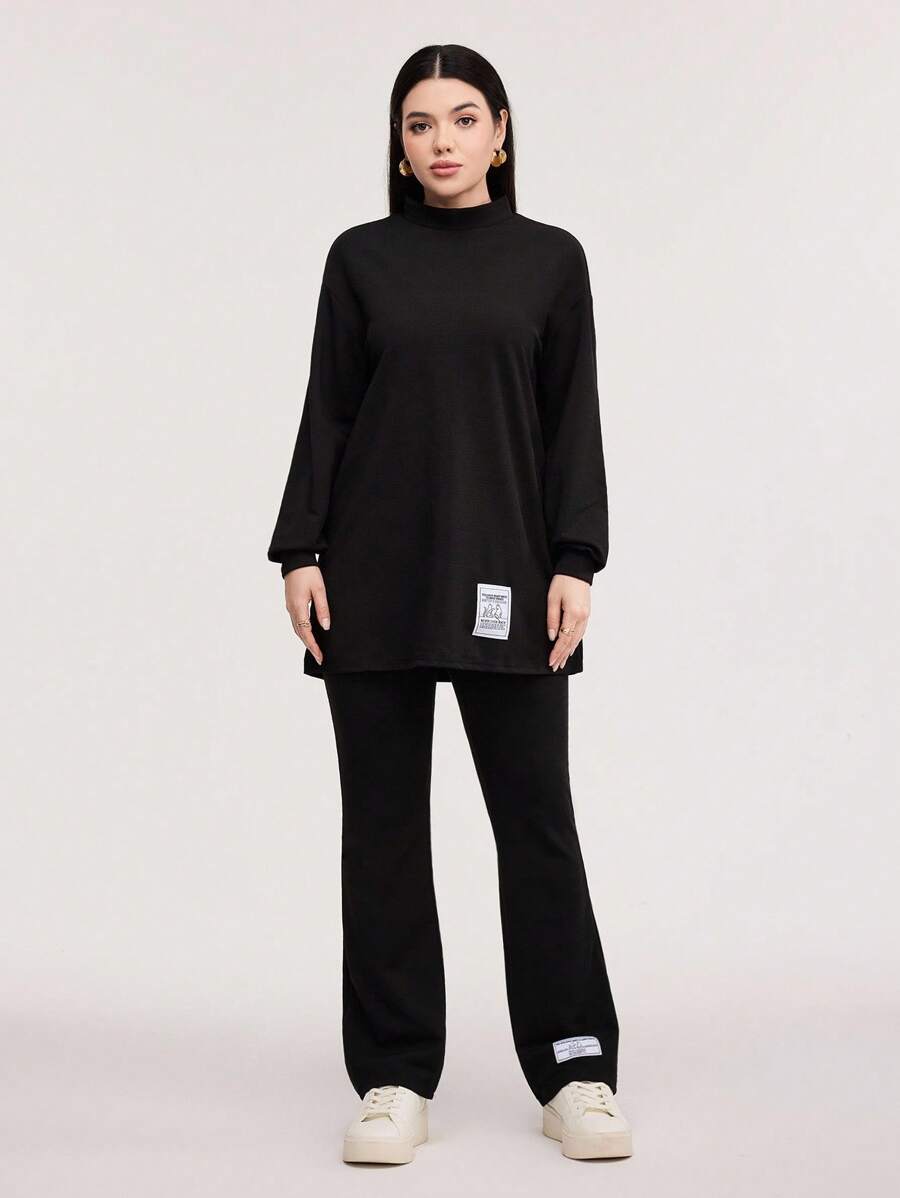 Veilorie Conjunto de 2 piezas con camiseta de cuello alto y hombros caídos, y pantalones - Negro - Ver 1