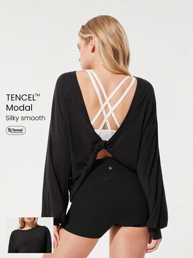 Camiseta de manga larga con diseño de abertura en la espalda, puños de linterna y bajo ajustado, hecha de TENCEL™ Modal, suave y sedoso, para uso diario y casual