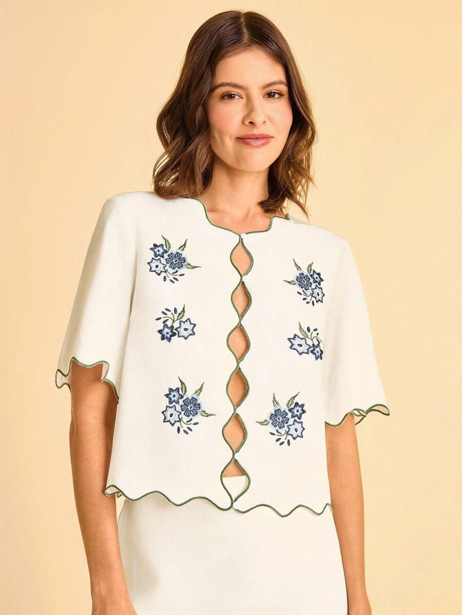 CAJUNI 女式白色半透明 V 领短袖休闲宽松波浪下摆刺绣花卉衬衫，适合夏季度假、约会和派对 - 白色 - 查看 1