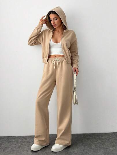 EURMUSE Street Style Aesthetic Two Pieces, Flare Sweatpants, High-Waisted Design, Ankle Ties Detail, Casual Wear, Athletic-Inspired Look, Comfortable Fit, Modern Fashion, Urban Style, Elasticated Waist, Drawstring Detail, Relaxed Silhouett, Contemporary Design, Off-Duty Look, Fashion Forward, Sportswear, Weekend Wear