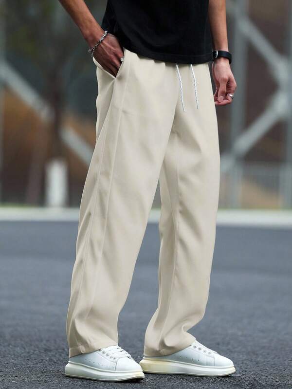 Manfinity Hypemode بنطلون رجالي أرجل واسعة بتصميم مريح، بنطلون رجالي فضفاض مستقيم الساق، بنطلون رجالي أبيض كريمي، بنطلون رجالي مطوي، موسم الخريف