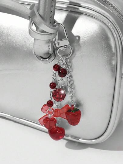 Kawaii 1 pièce Porte-clés/Charm de sac Y2K avec chaîne creuse, faux cristal rouge, boule en résine strass en argile douce, nœud en forme de fraise. Convient pour le port quotidien des femmes/filles, cadeau de vacances