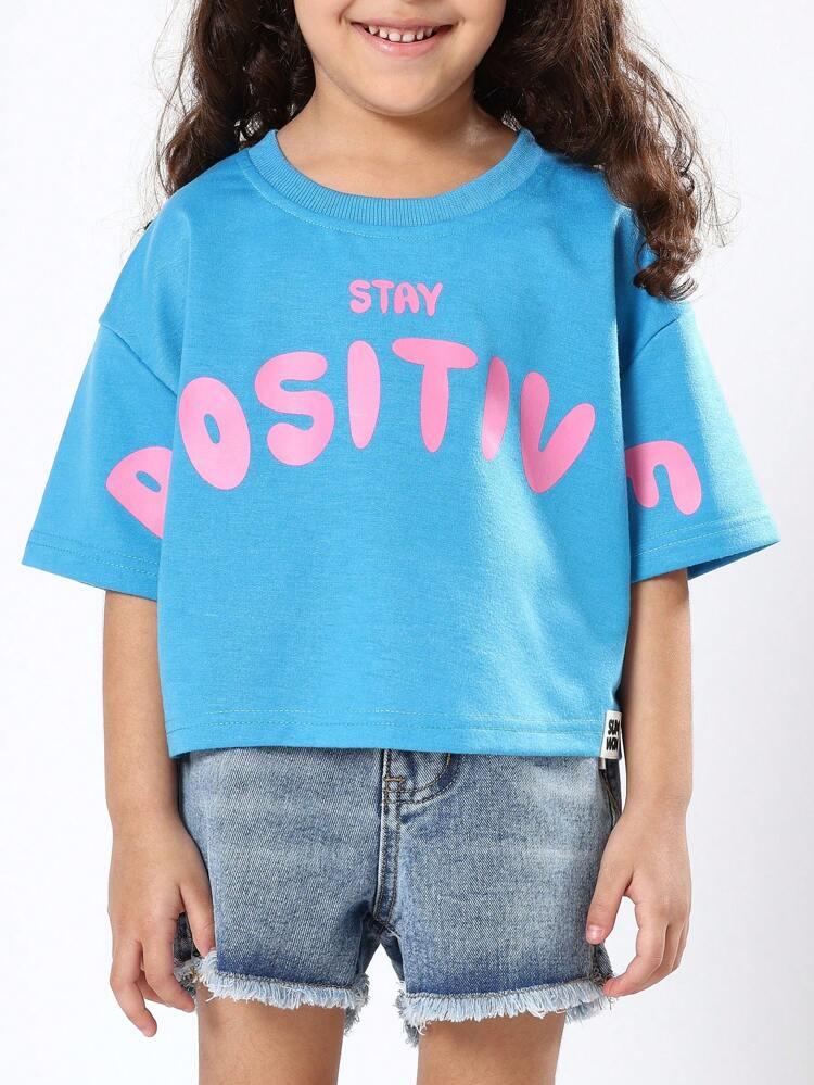 Maglietta corta "Stai positivo" con testo rosa