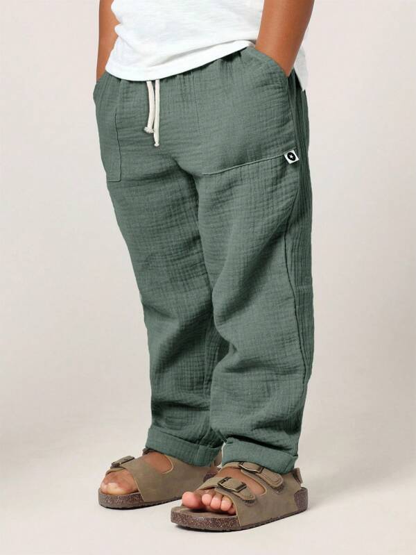 SUMWON Pantalones de algodón de muselina cómodos con elástico en la cintura, transpirables, para actividades casuales y diarias de los niños pequeños, ajustables