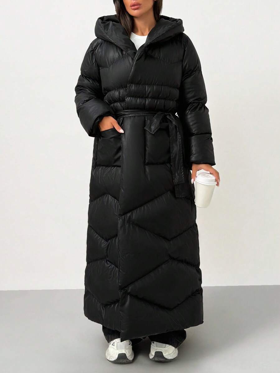 EURMUSE Women Solid Color Belted And Pocket Detailed Long Winter Coats - Black - View 1