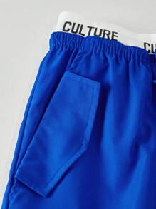 SHEIN Bộ 2 món cho bé gái tuổi teen: Áo hai dây in hình ngôi sao phối cùng quần cargo ống rộng phối màu, trang phục thường ngày phong cách đường phố, thích hợp cho mùa xuân/hè. - Xanh đậm - Xem 5