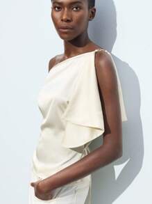 Maija 一件白色不对称领口女式上衣，百搭、优雅、时尚都市风，舒适休闲，适合商务或休闲场合，如音乐会、社交活动、办公室穿着、邮轮度假、优雅海滩、波西米亚风度假装，四季皆宜，明星同款度假风，异域风情，乡村音乐会、西部风情，高档面料，舒适透气，现代都市休闲时尚，商务休闲女装，低调复古风，派对上衣，海滩夏季假期，每个假期都适合穿着 - 白色 - 查看 2