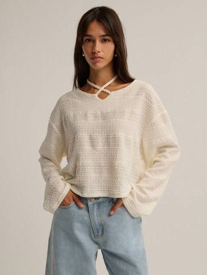 Nöista 长袖针织衫，方形廓形，独特的挂脖式肩带设计，打造轻松别致的造型，是女士冬季穿搭的完美之选；易于日常穿着，适合休闲季节造型、节日圣诞节装扮和现代新年装束。