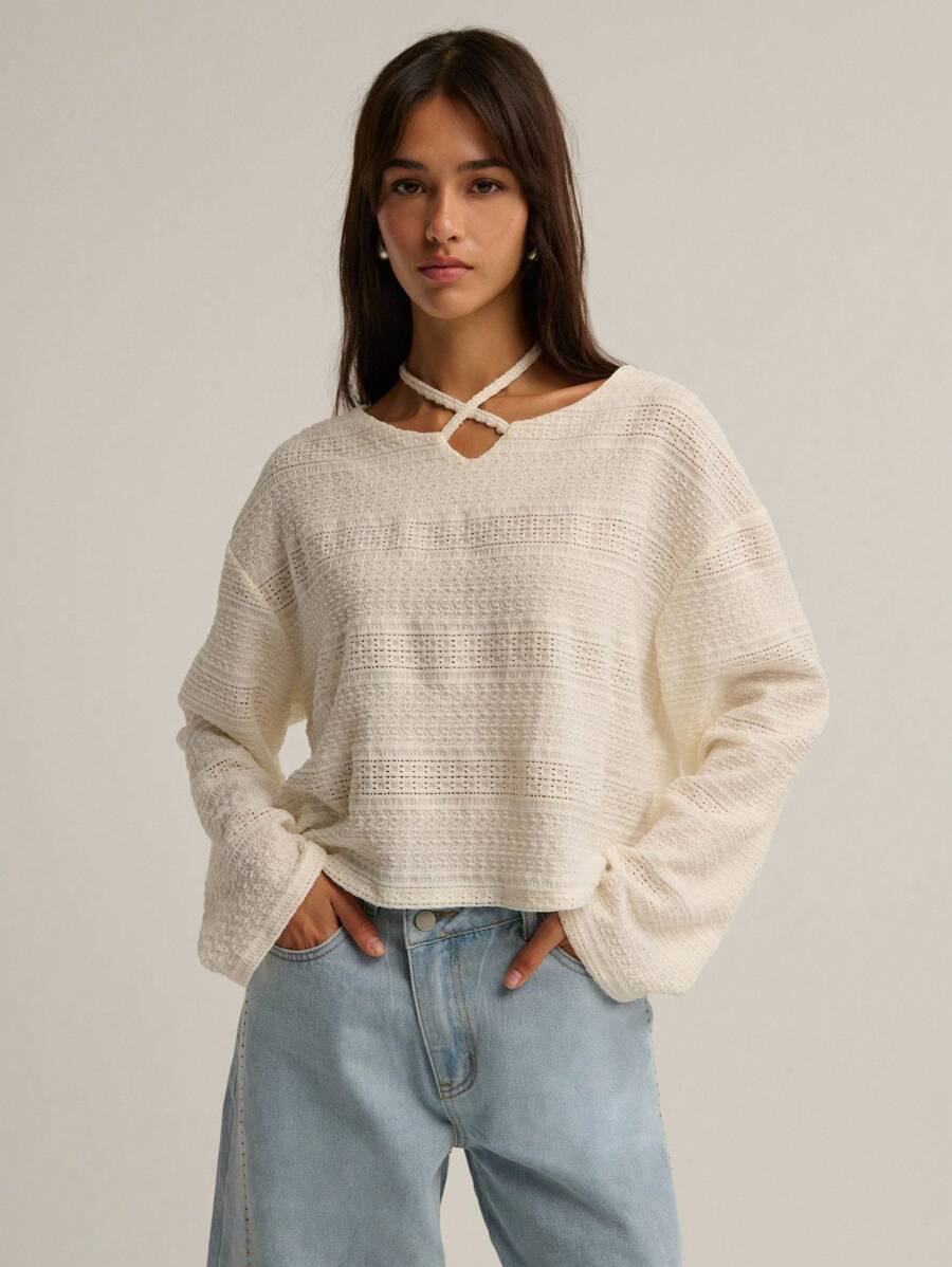 Nöista 长袖针织衫，方形廓形，独特的挂脖式肩带设计，打造轻松别致的造型，是女性冬季的完美之选；易于日常穿着，适合休闲季节装扮、节日圣诞节和现代新年装束。 - 米色 - 查看 1