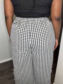 Truni Calça Pantalona de Perna Larga com Laço em Contraste em Xadrez Preto e Branco, Plus Size, Casual