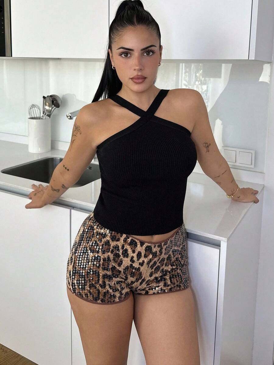 Lucia Bellido Top de punto ajustado a rayas con cuello halter para mujer