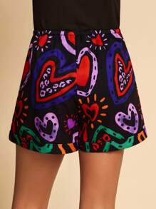 SHEIN Pantalones cortos tejidos con estampado de corazón para niña preadolescente