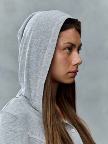 TypaGal This Slim-Fit Cropped Hoodie Features Pink Contrast Buttons And Curved Seams, Blending Comfort With A Feminine Twist. A Cozy Staple For Your Back To School Or Fall Outfits For Women Lineup.