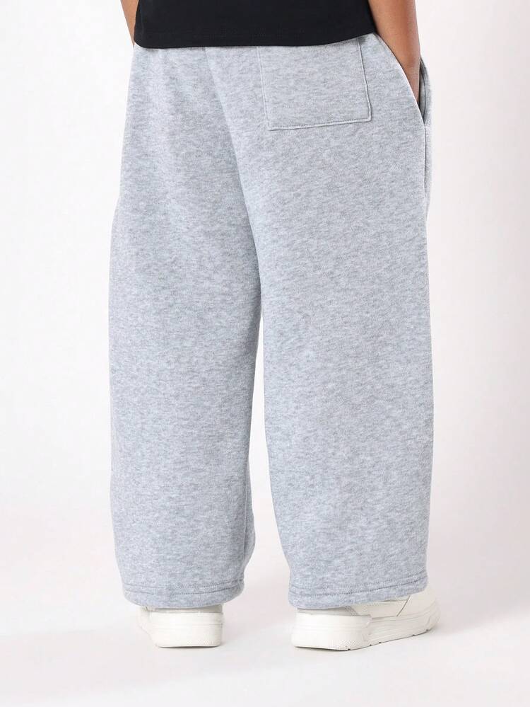 Loose Fit Sweatpants With Elastic Waist And Side Pockets