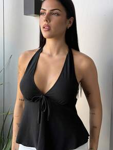 Lucia Bellido Top a babydoll con scollo a V nero, fiocco e schienale aperto, per donne, abbigliamento casual da vacanza adatto per l estate - nero - Visualizzare 4