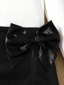 SHEIN Tween Girl Fashion Casual 2 Pieces Set: Knit Letter Graphic Print Crew Neck Long Sleeve Fitted T-Shirt + PU Leather Solid Bow Decor Snug Fit Mini Skirt, Autumn/Winter Outfit Bow Skirt Black And White Skirt Girl Outfit Black And White - Black and White - View 5