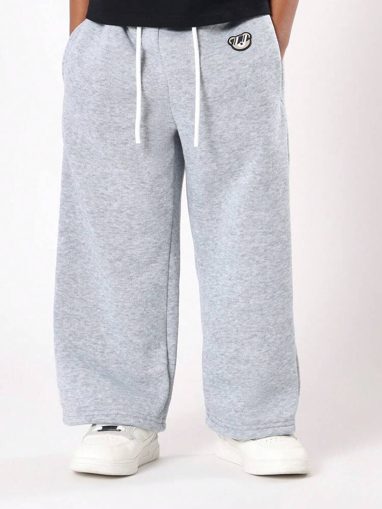 Loose Fit Sweatpants With Elastic Waist And Side Pockets