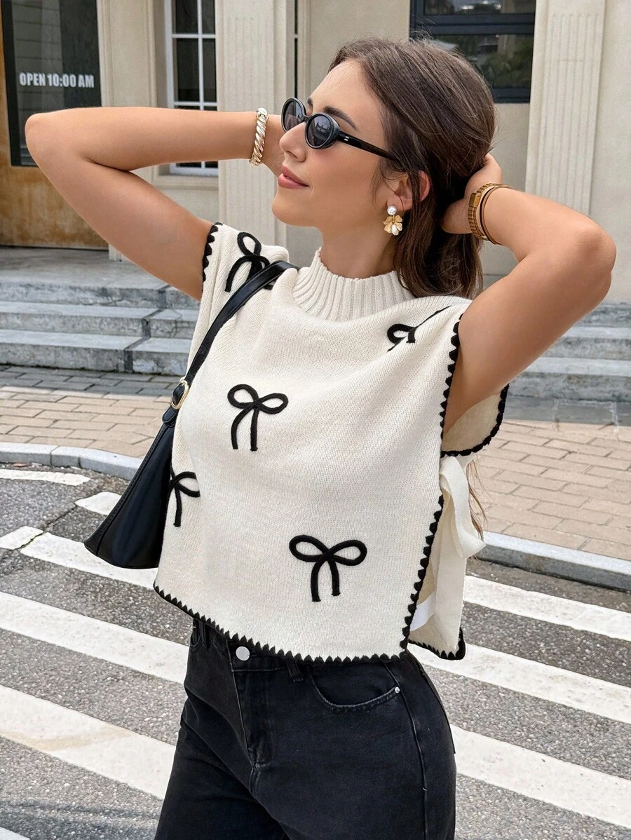 Serisse 女款撞色镶边立领无袖蝴蝶结装饰毛衣背心,宽松小立领3D蝴蝶结休闲毛衣背心,休闲百搭,秋冬休闲圆领钩针贝壳装饰撞色镶边毛衣上衣 - 彩色 - 查看 1