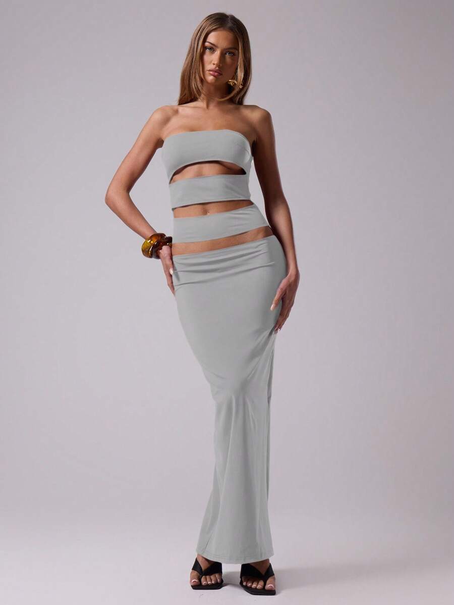 MUSERA 这款修身优雅的无袖连衣裙采用性感镂空设计，适合春夏俱乐部度假、伊比沙岛海滩音乐节、婚礼宾客派对等场合。它同样适合春夏赛马会、度假、婚礼宾客、毕业典礼等场合，尽显性感魅力。 - 灰色 - 查看 1