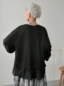 FRIFUL Women's Black Solid Color Round Neck Drop Shoulder Long Sleeve Patchwork Sheer Fabric Loose Casual Versatile Sweatshirt, Autumn/Winter