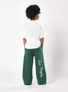 SUMWON Pantalones de chándal con logo de guión de Los Ángeles, ajuste cómodo de pierna ancha, pantalones de invierno, ropa de equipo juvenil, ropa de espíritu escolar de otoño - Verde Oscuro - Ver 5