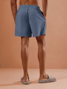 SUMWON 常规版型百慕大泳裤，夏季沙滩泳池适用，弹性腰带抽绳设计，舒适休闲，适合度假泳装、休闲服等多种场合。纯色款。 - 水鴨藍 - 查看 4