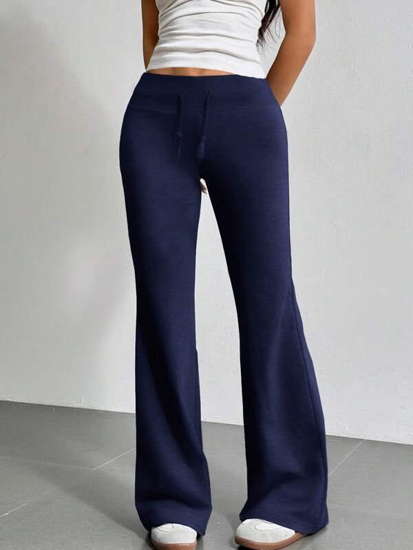 SHEIN Pantalones acampanados de punto informales y deportivos para niñas preadolescentes de