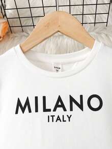 SHEIN Tween Girl Fashion Casual 2 Pieces Set: Knit Letter Graphic Print Crew Neck Long Sleeve Fitted T-Shirt + PU Leather Solid Bow Decor Snug Fit Mini Skirt, Autumn/Winter Outfit Bow Skirt Black And White Skirt Girl Outfit Black And White - Black and White - View 6