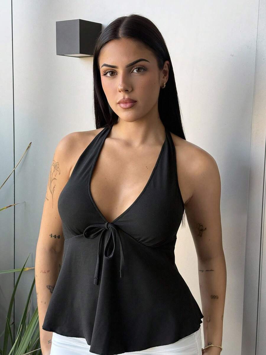 Lucia Bellido Top a babydoll con scollo a V nero, fiocco e schienale aperto, per donne, abbigliamento casual da vacanza adatto per l estate - nero - Visualizzare 1