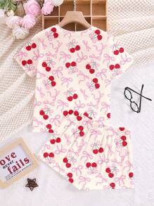 SHEIN Cream White, Cute & Sweet Mini Pink Bow Cherry Print Tween Girl Casual Minimalist Round Neck Short Sleeve T-Shirt And Shorts Pajama Set, Suitable For Summer, Chill Chill Summer! Crush Your Loungewear Game With The Cherry Bow Repeat Two Pieces PJ Set! For Slouchy Mornings, Late-Night Snack Runs, And Party Selfies. - Multicolor - View 2