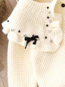 Cardigan a contrasto bianco e nero carino per ragazze, cardigan lavorato a maglia con collo rotondo, maniche lunghe, grandi risvolti, texture a volant e decorazione con fiocco, cardigan in maglia caldo e confortevole - Bianco - Visualizzare 6