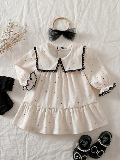 Souflis Souflis Baby Girls' Ruffled Collar Long Sleeve A-Line Dress With Tulle Bow Headband. The Oversized Collar, Puff Sleeves, And A-Line Silhouette Create A Fashionable And Classic Look. Whether For Outings Or Casual Wear At Home, The Little Princess Will Be The Center Of Attention. Baby Girl Dress Polka Dot Dress Baby Fall Winter