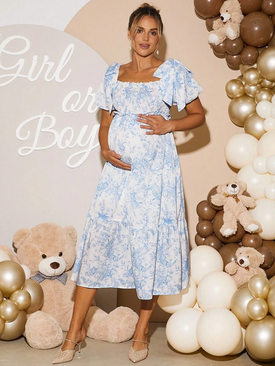 Loomaby 孕妇夏季休闲派对和度假花卉印花方领泡泡袖蝴蝶结装饰荷叶边下摆宽松连衣裙孕妇装婴儿洗礼连衣裙性别揭示连衣裙孕妇友好连衣裙蓝色花卉孕妇装 - 藍白色 - 查看 1