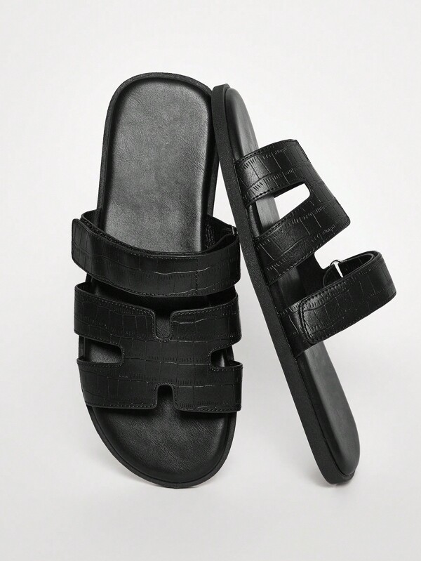 SHUZIA #LuxuryDesign Men's Black -Embossed H-Cutout Slides With Adjustable Strap – Premium Streetwear Meets Yacht Club Style, Combining Luxe Look With Everyday Comfort.