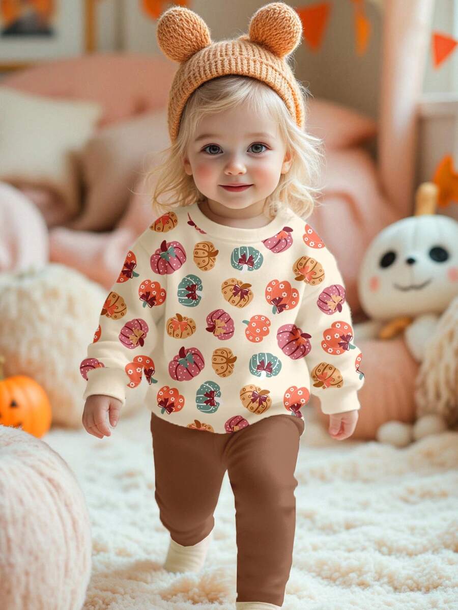 SHEIN Happikins 杏仁色可爱花卉蝴蝶结小南瓜图案秋日女婴休闲柔软加厚圆领长袖卫衣和打底裤套装，适合秋冬季节，舒适透气，适合女婴秋季叠穿，时尚百搭，休闲装扮，女婴图案服装，秋季服装，适合外出、野餐、居家、农场、万圣节等场合。