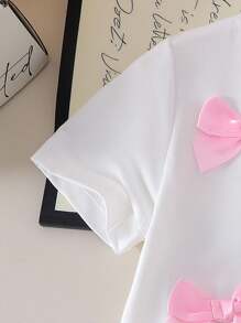 Girls Casual Short Sleeve Bow Decor White T-Shirt And Black Pleated Skirt Set, School Style Summer Outfit